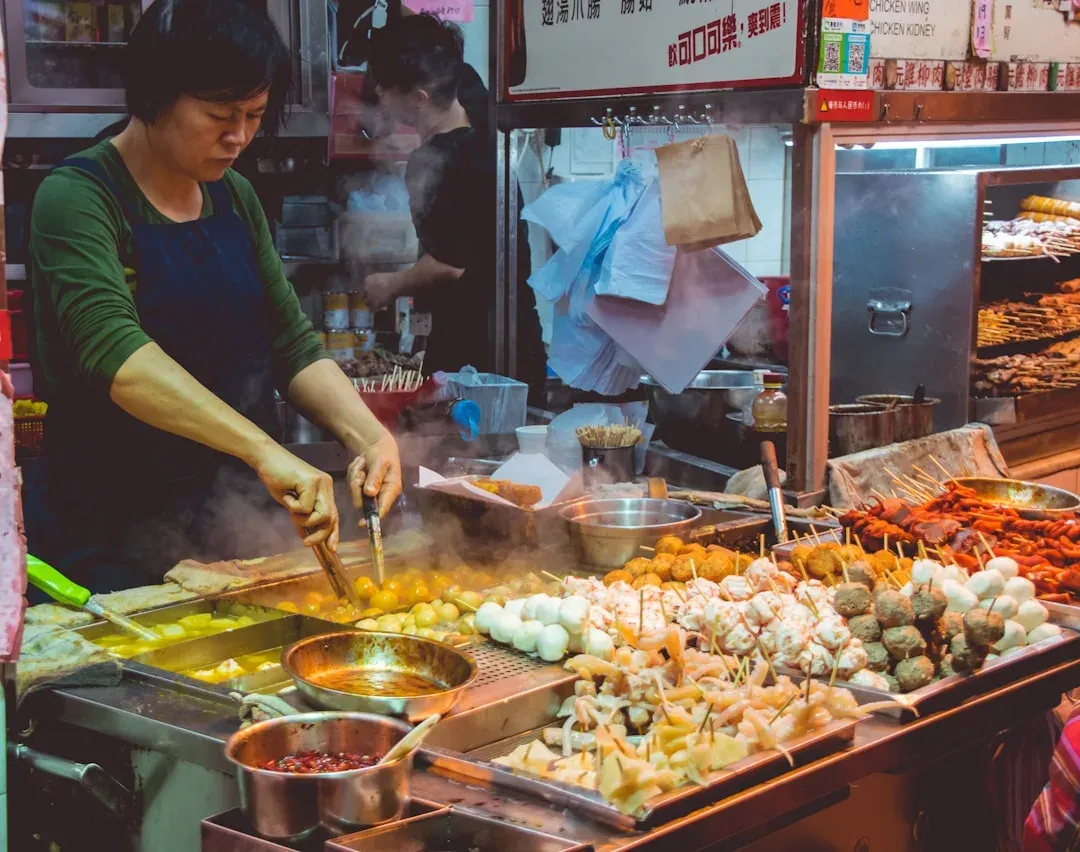 colorful street food market with vendors and customers
