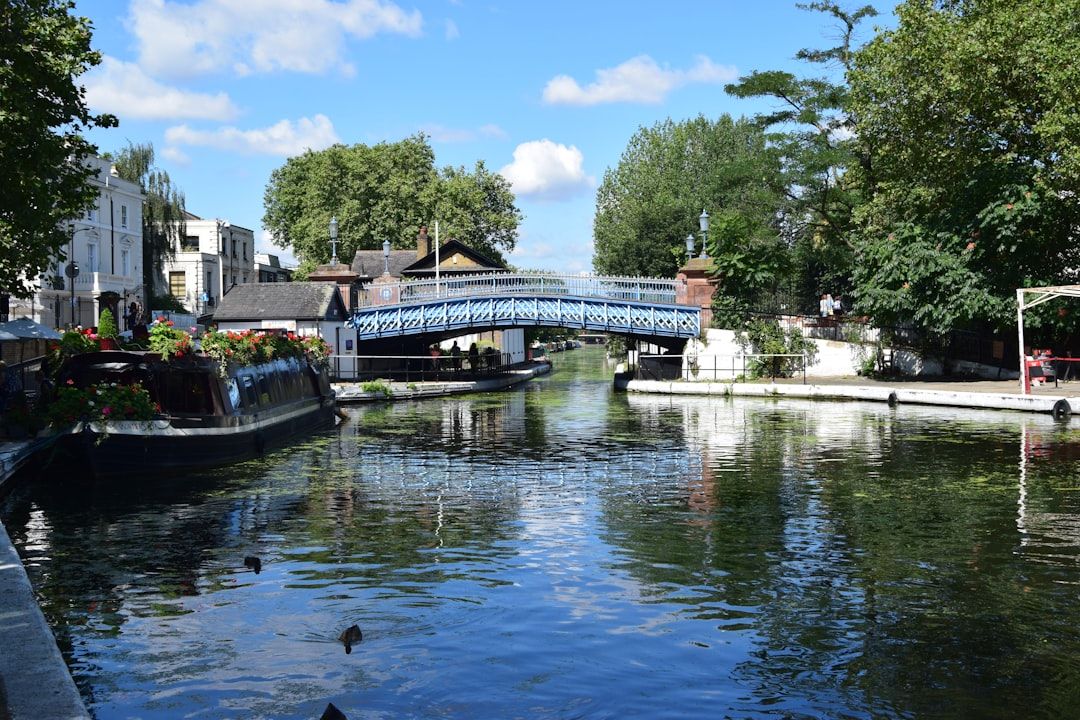 Narrowboats moored along the Regents Canal towpath at Little Venice London