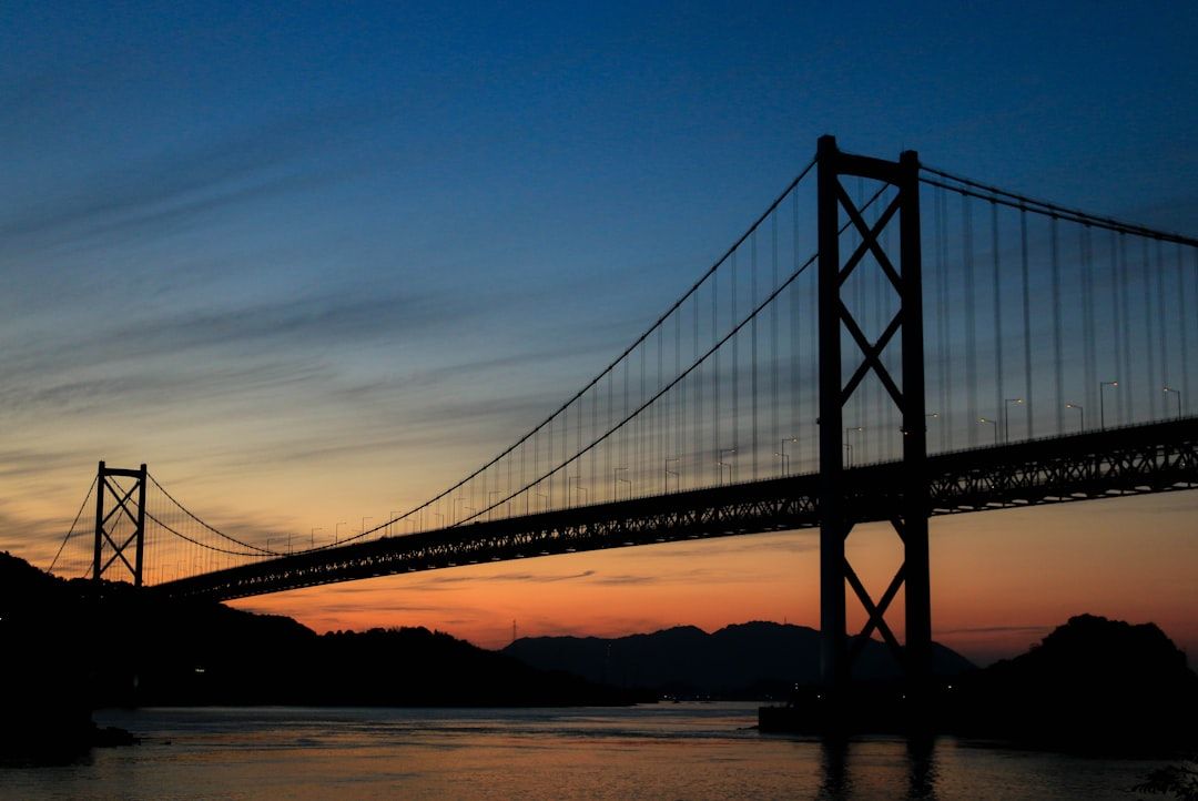 Cyclist on the dedicated Shimanami Kaido bridge cycleway over the Seto Inland Sea